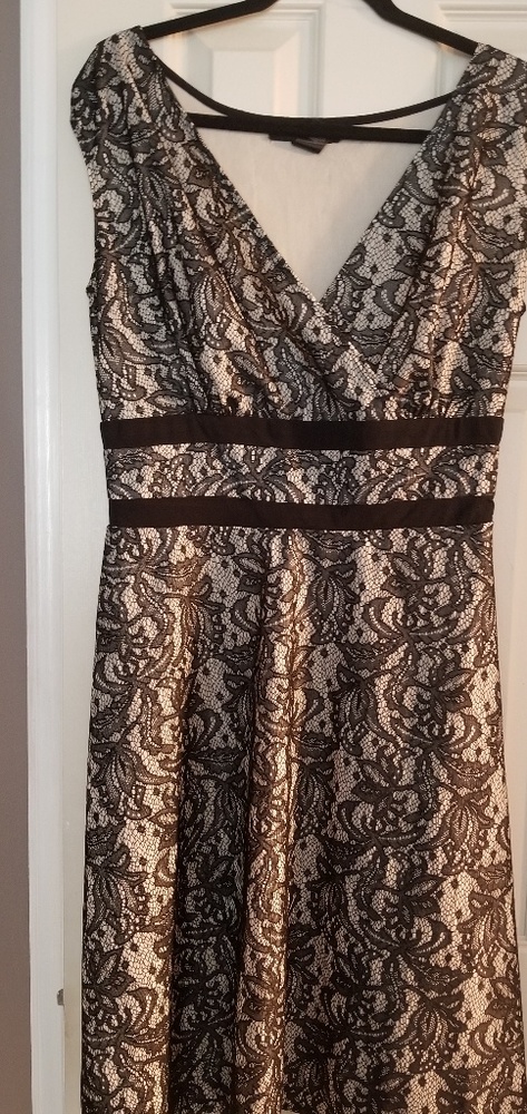 Woman black lace evening dress.